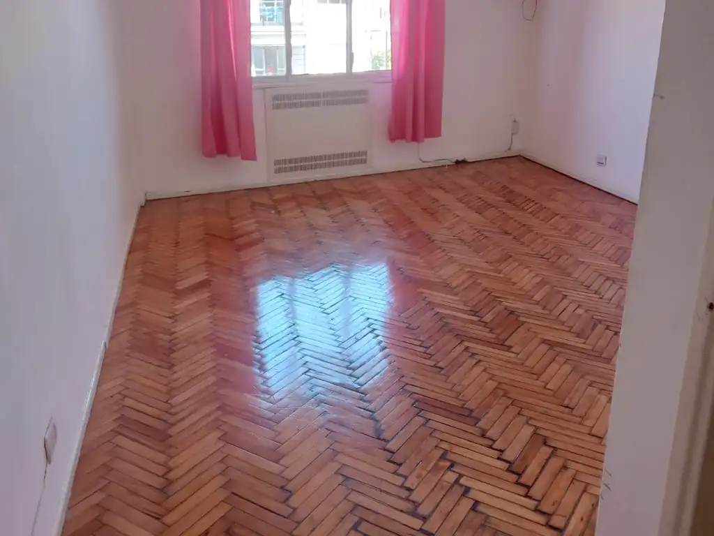 Estúdio de frente, cozinha separada