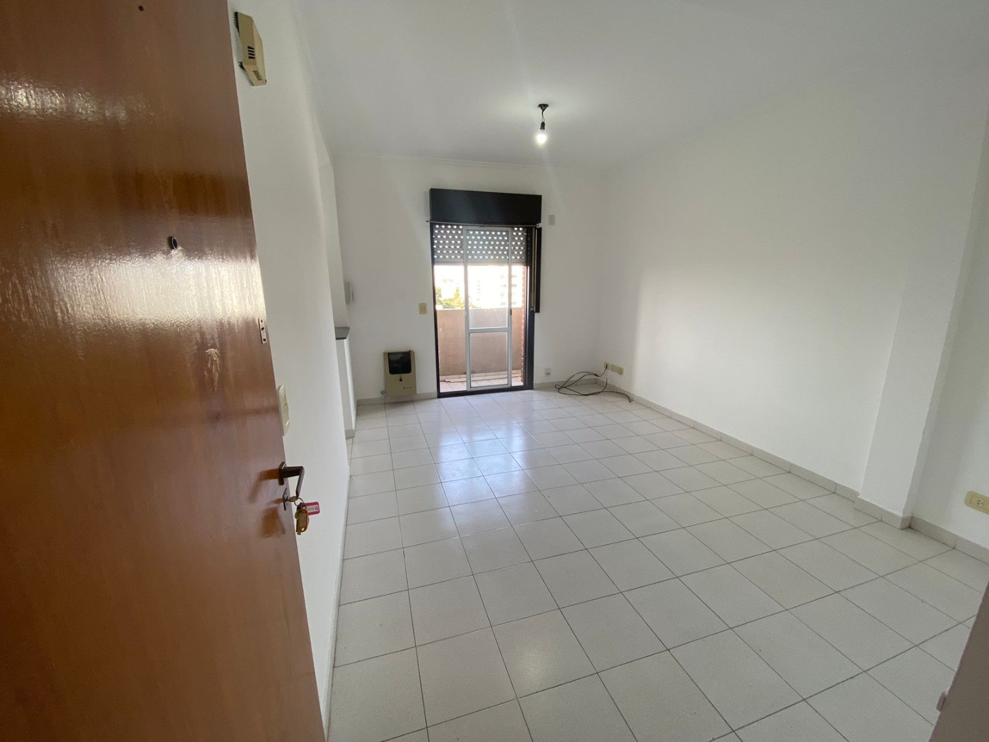 Apartamento de 1 dormitório com varanda na frente em Buenos Aires