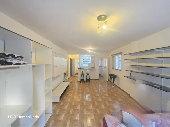 Apartment or office in Recoleta, street-facing across from the university
