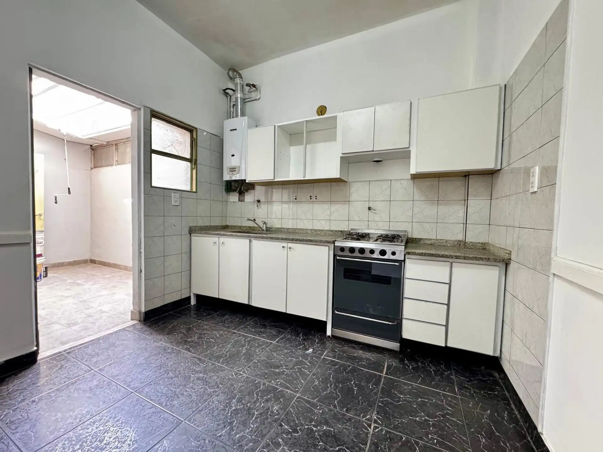 Departamento en planta baja de 3 ambientes en Villa Pueyrredón