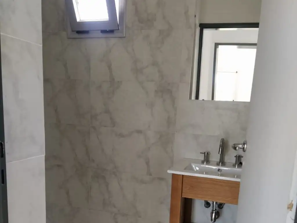 Apartamento de dois ambientes com vaga em Quilmes