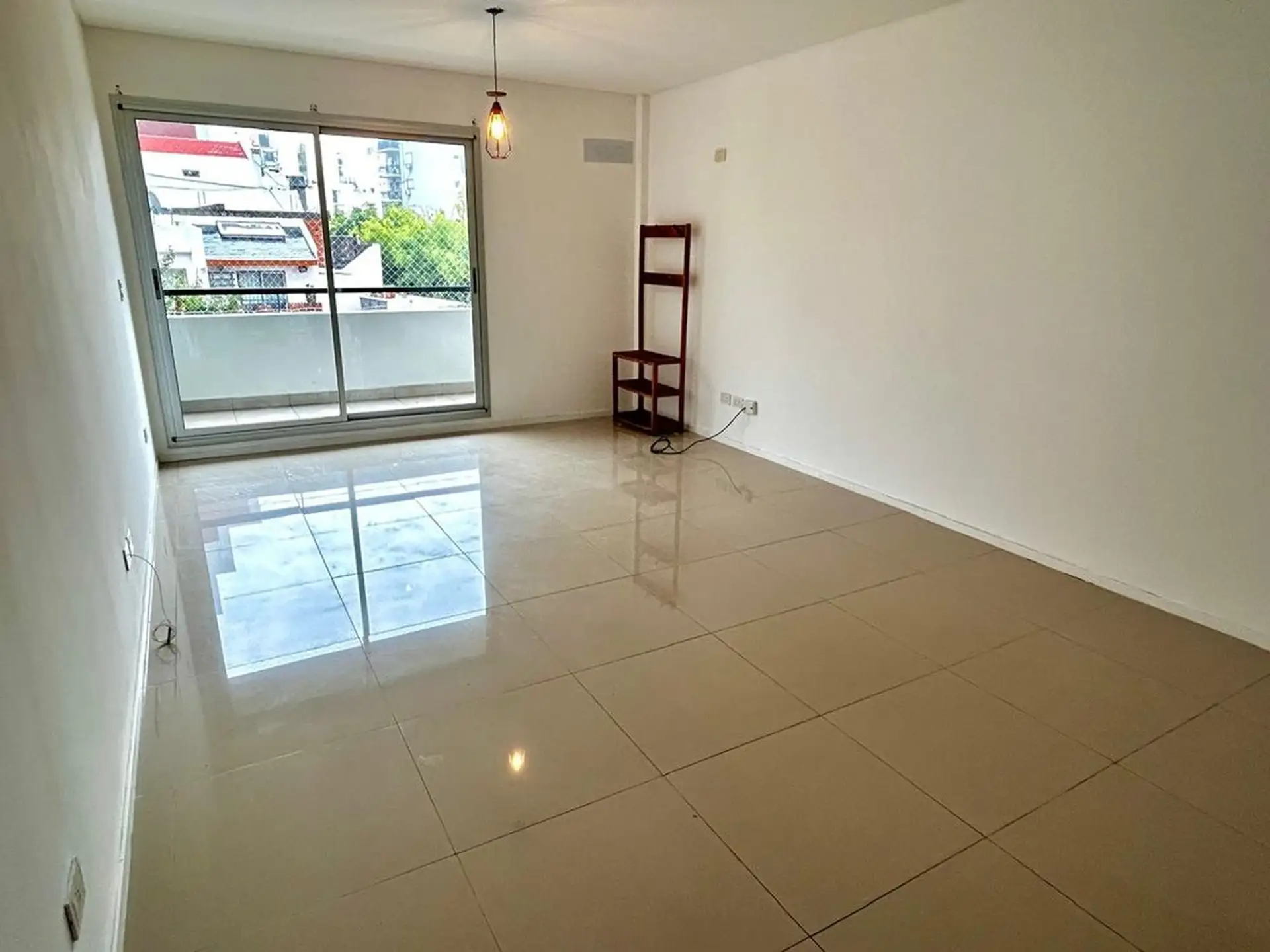 Kitnet de um ambiente com varanda em Caballito