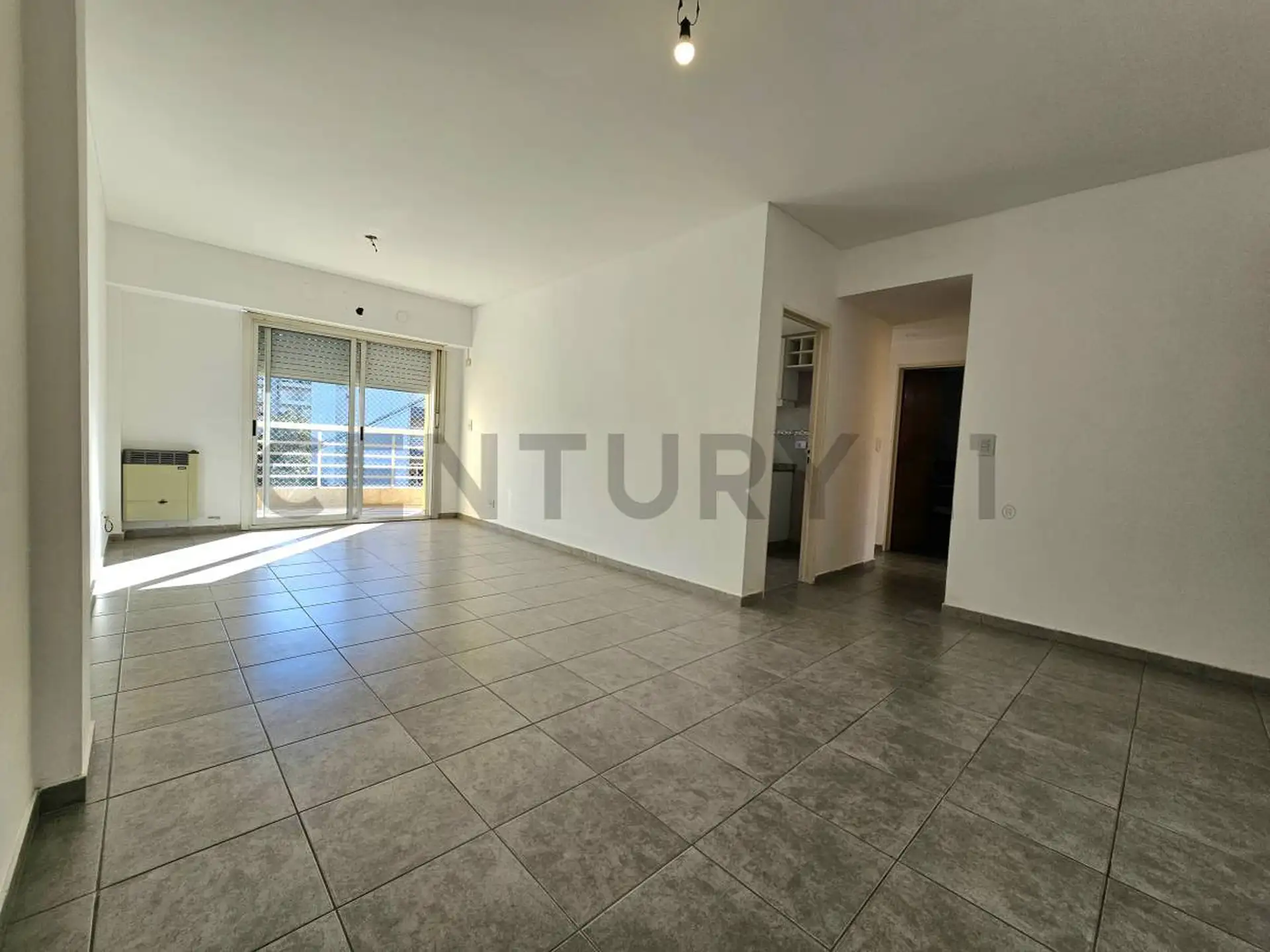 Apartamento de 2 dormitórios com vaga coberta em Morón