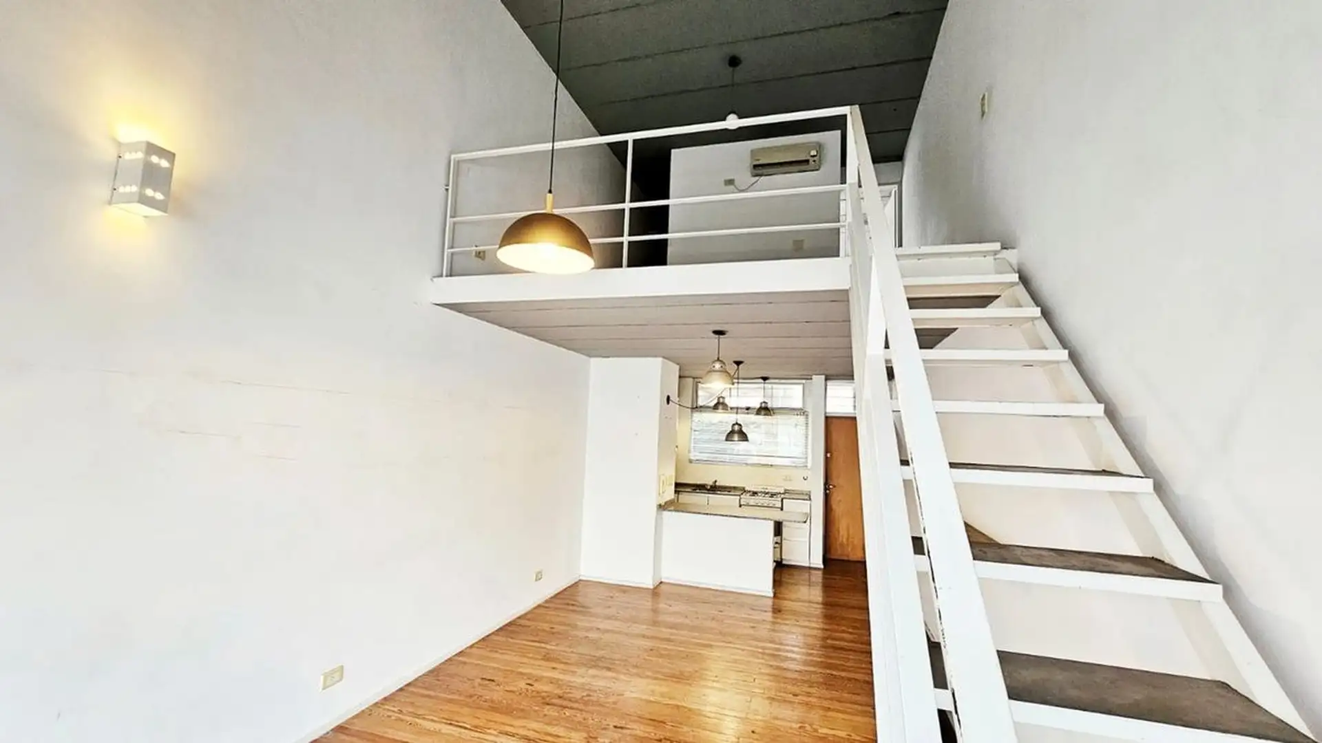Loft with double-height and balcony
