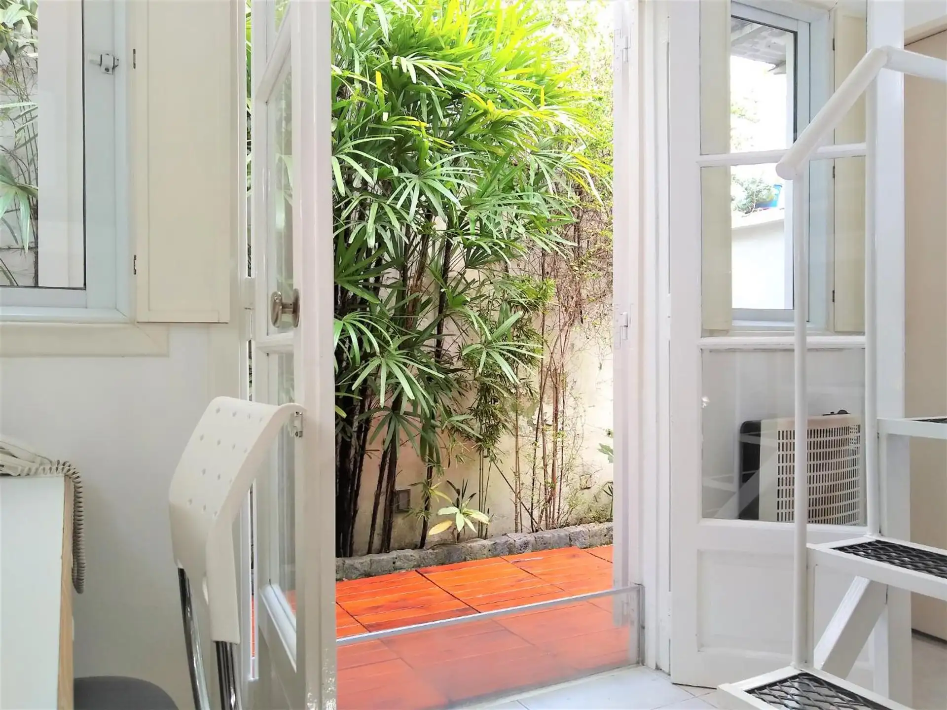 Loft with private green patio