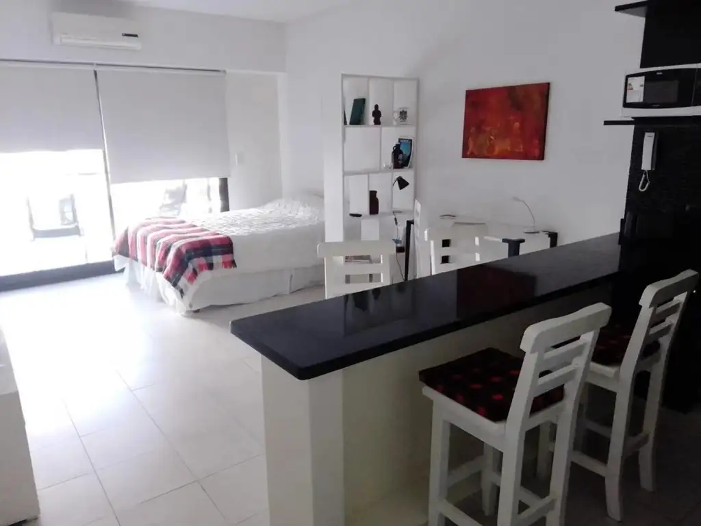 Mobiliado com varanda nos fundos