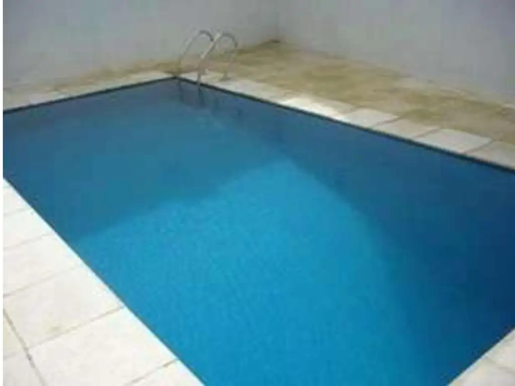 Apartamento com varanda e piscina