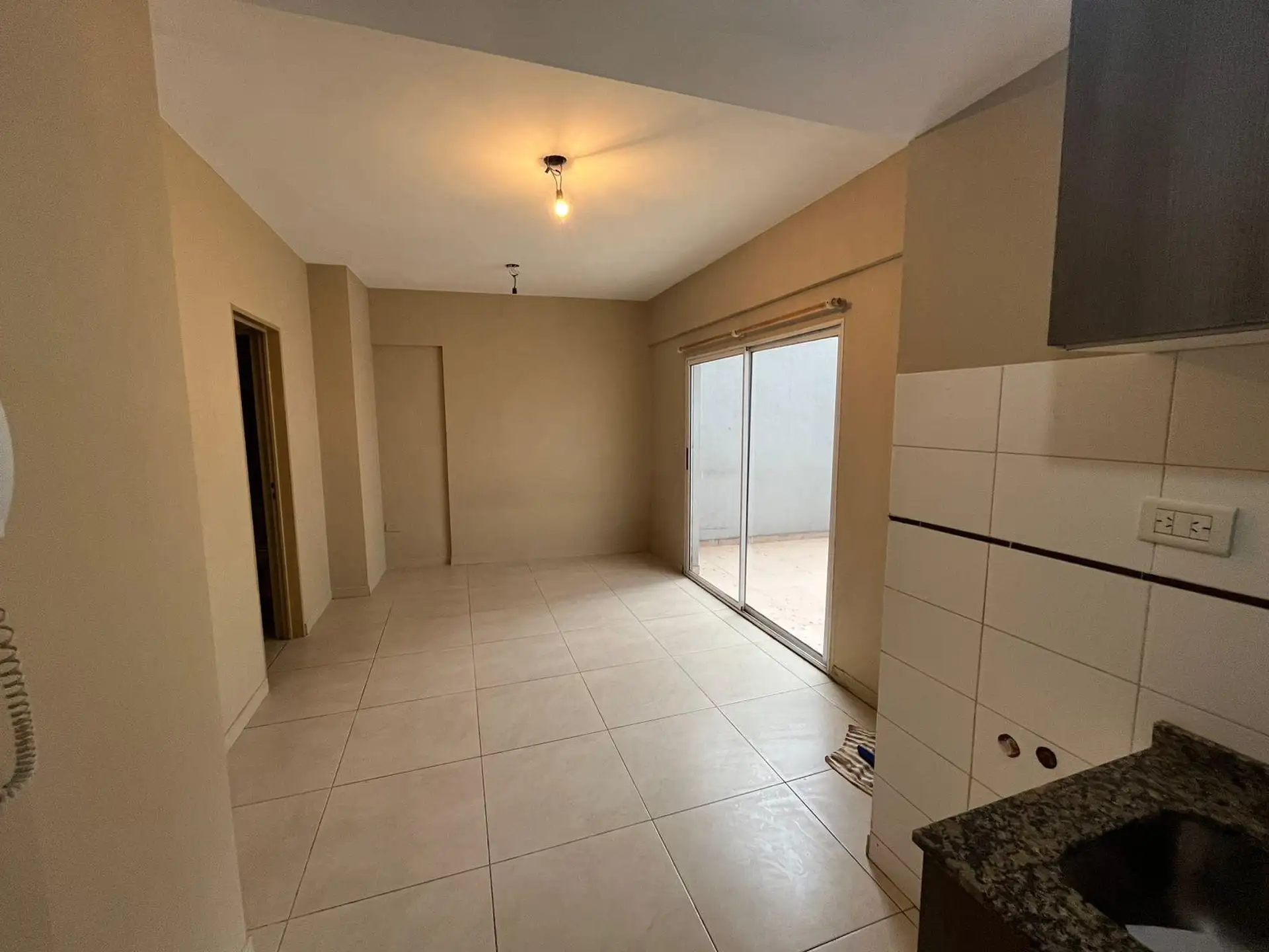 Studio with patio and integrated kitchen
