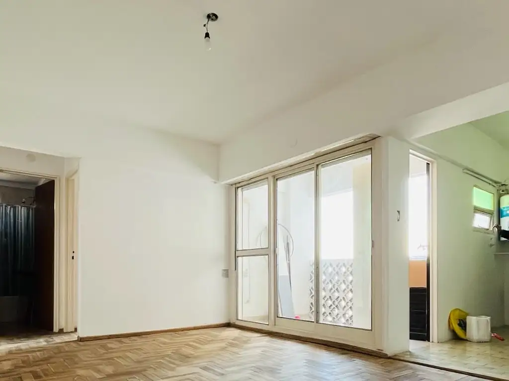 Apartamento com varanda semi-coberta