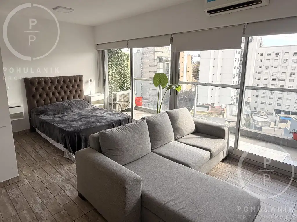 Monoambiente piso 8 con balcón