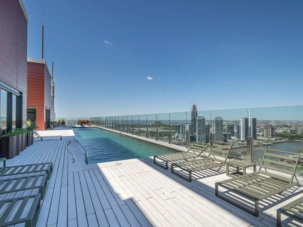 1 ambiente con balcón y amenities