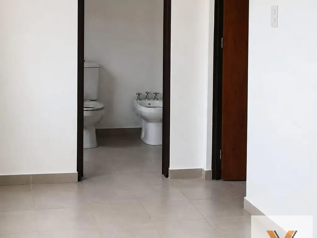 1 dormitorio con patio