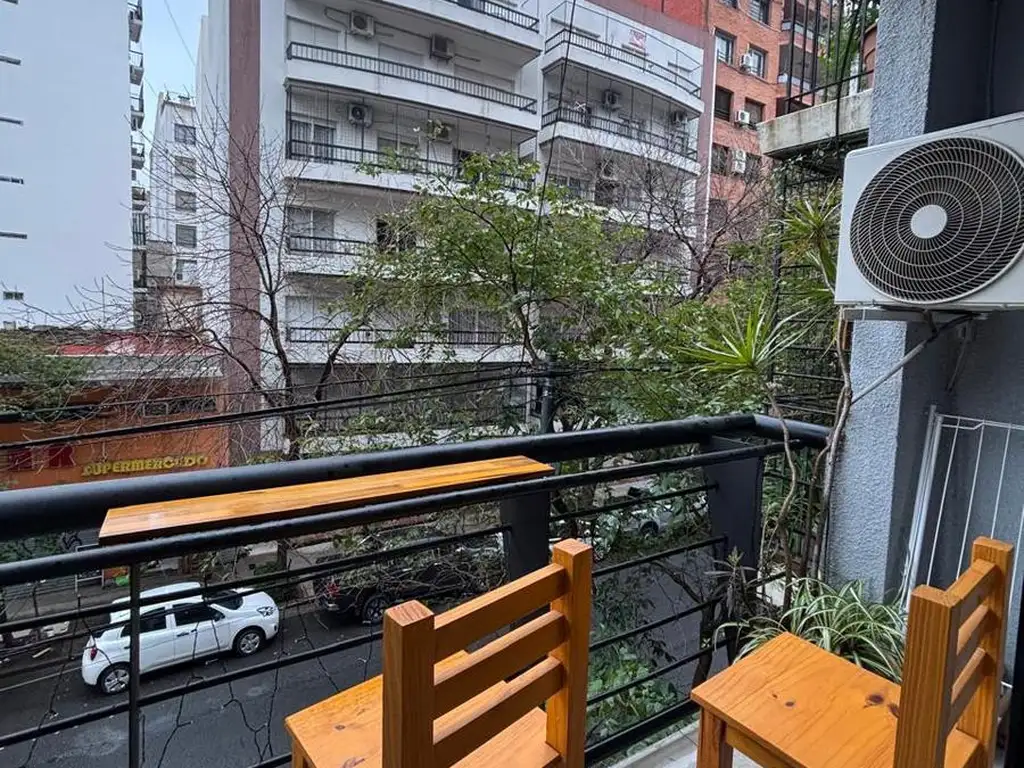 Studio com varanda e radiadores