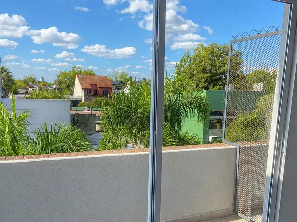 Loft doble altura con balcón