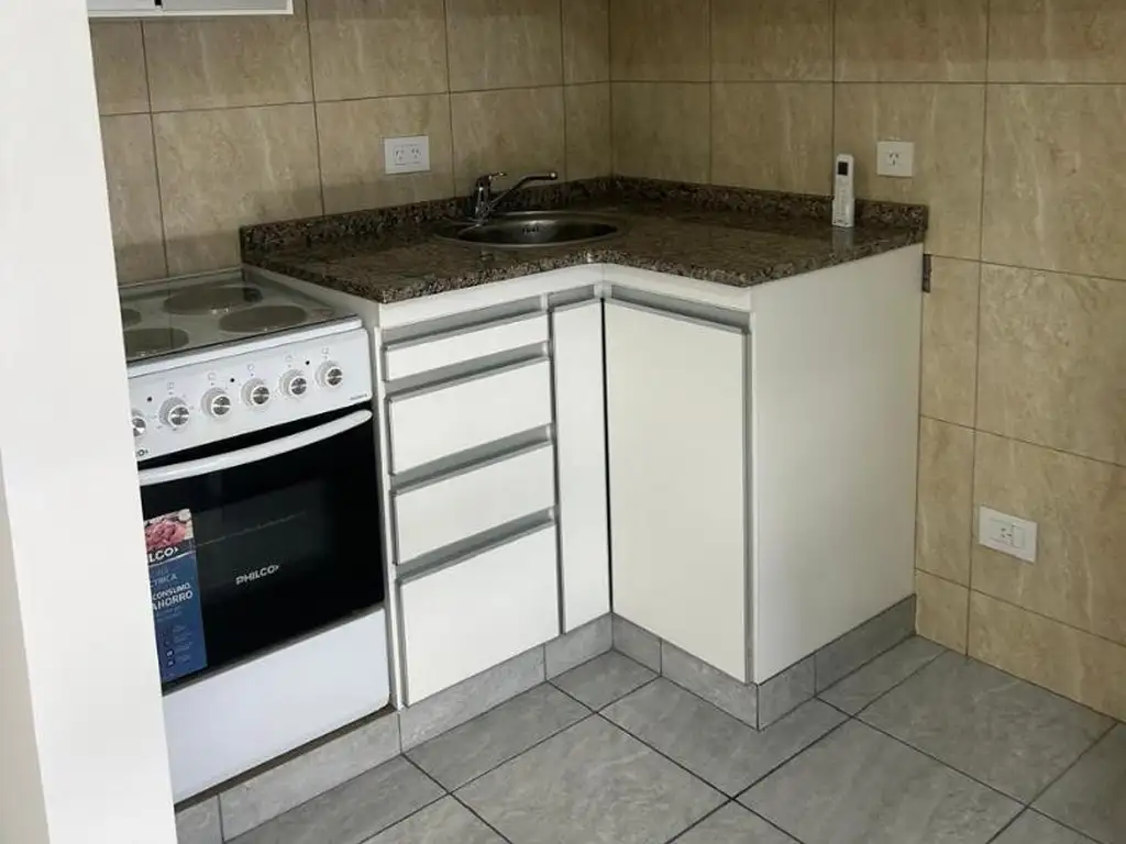 Cocina comedor integrada, cochera