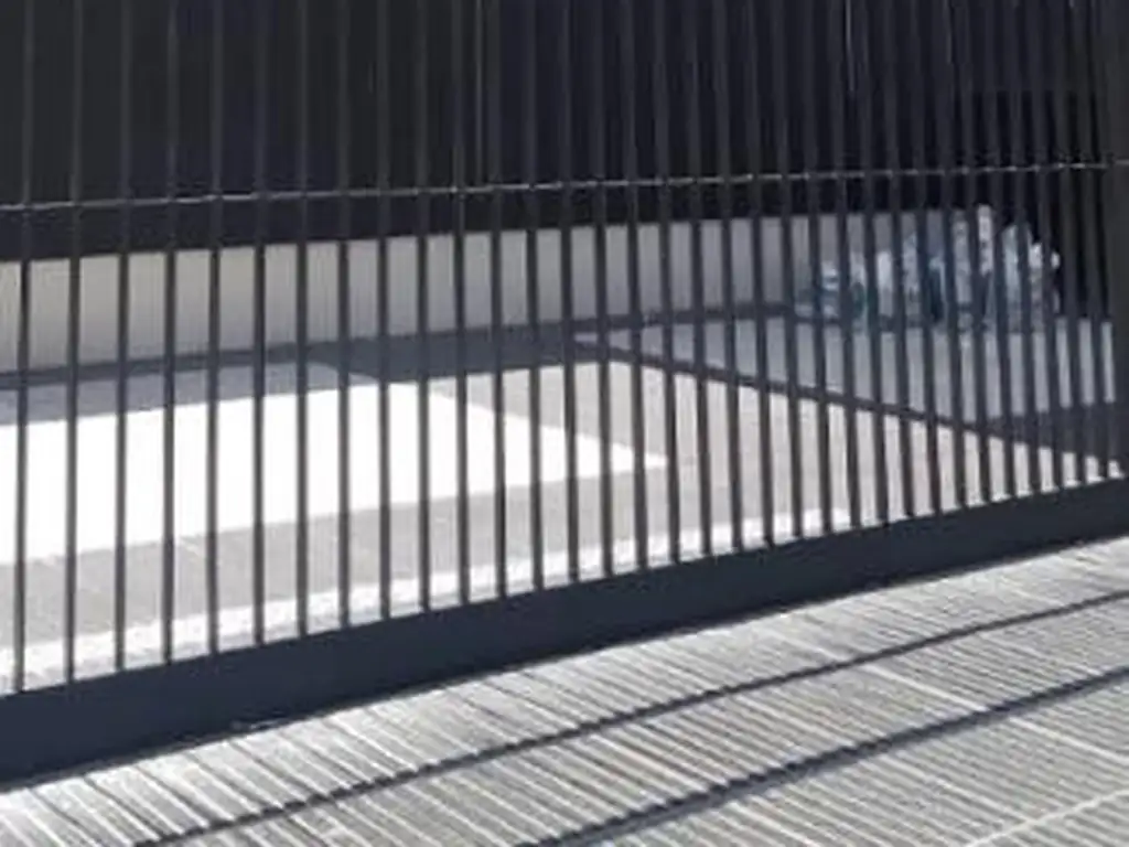 Monoambiente con balcón corrido