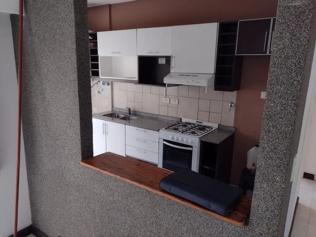 Balcón y cocina a gas