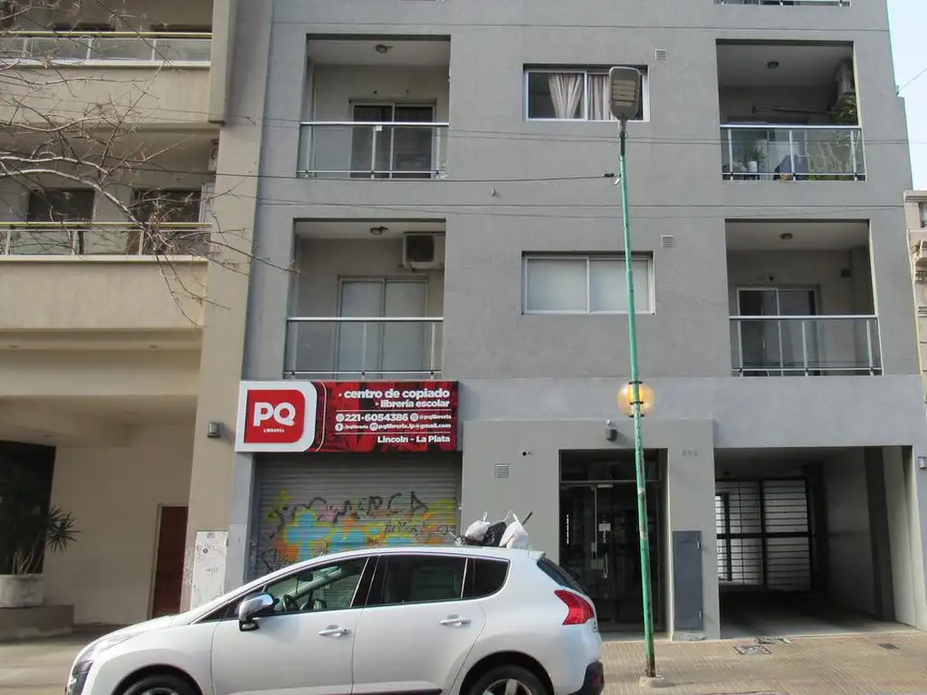 1 dormitório, varanda frente e fundos