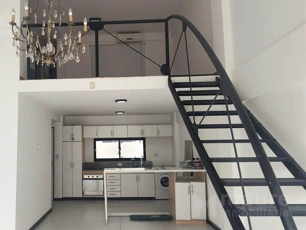 Loft con balcón aterrazado