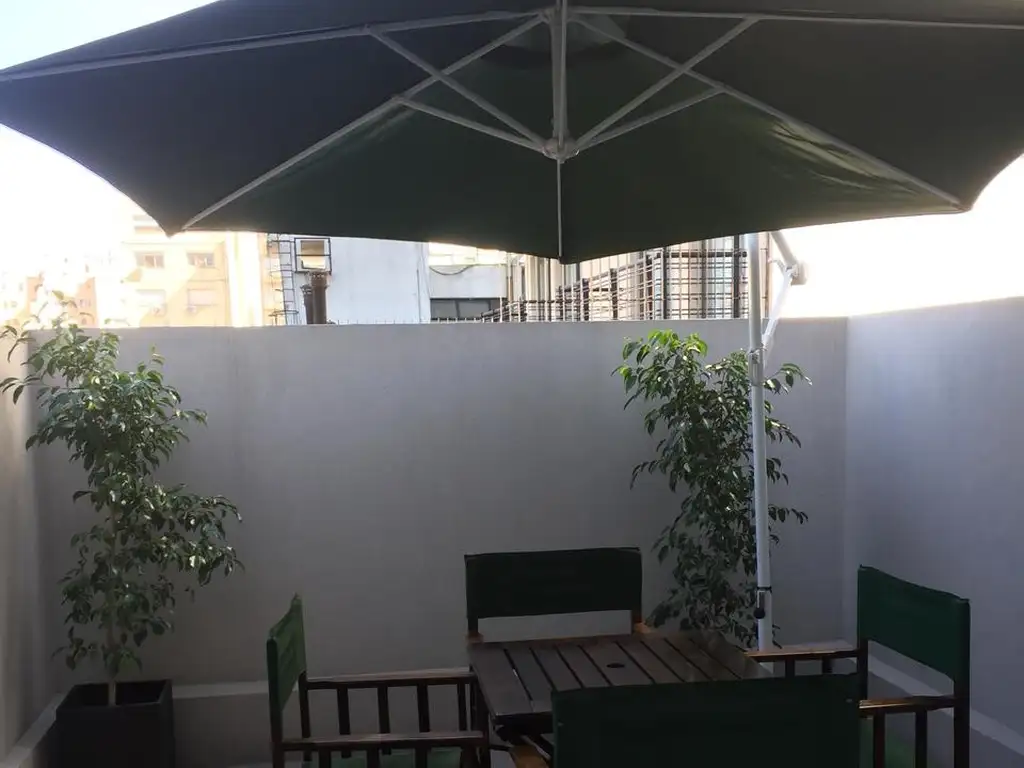 Monoambiente con patio y amenities