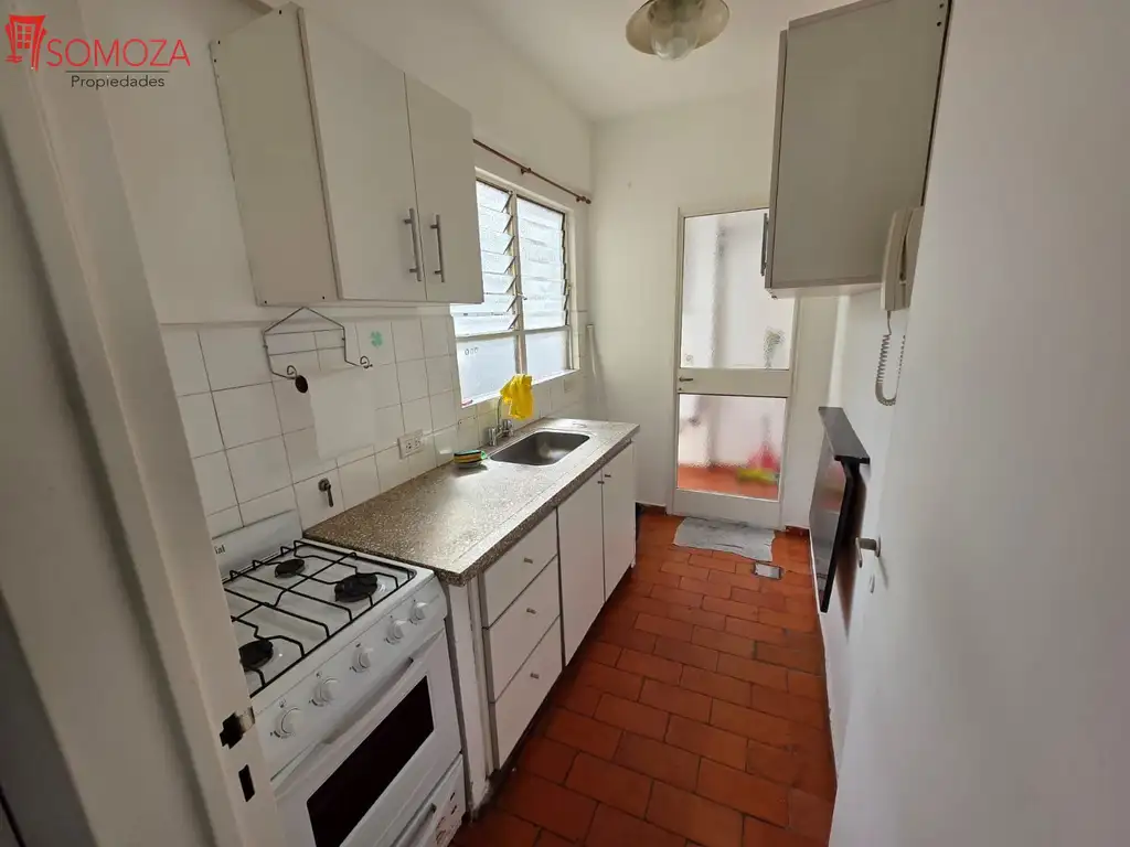Balcony and equipped kitchen