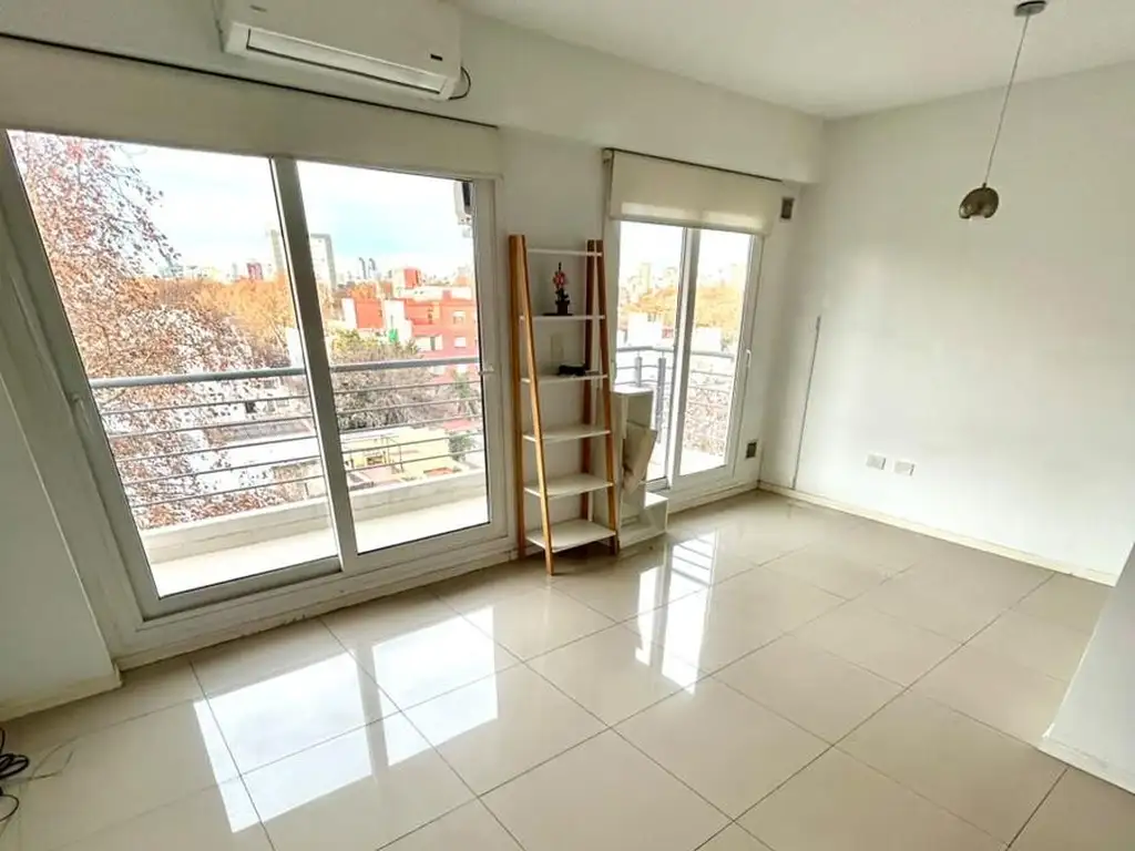 Monoambiente con balcón