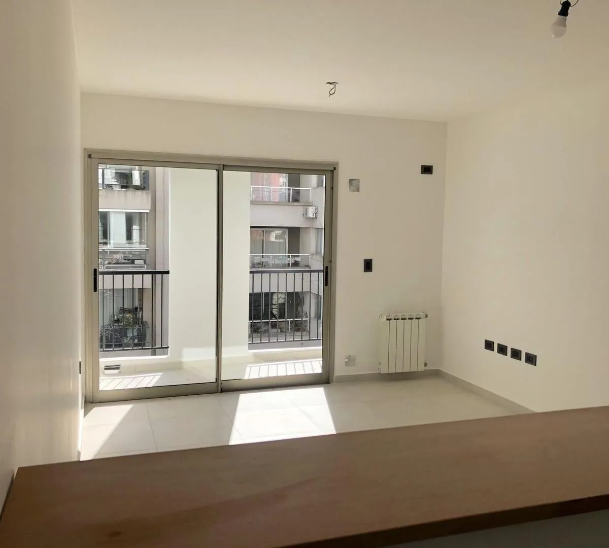 Monoambiente con balcón y DVH