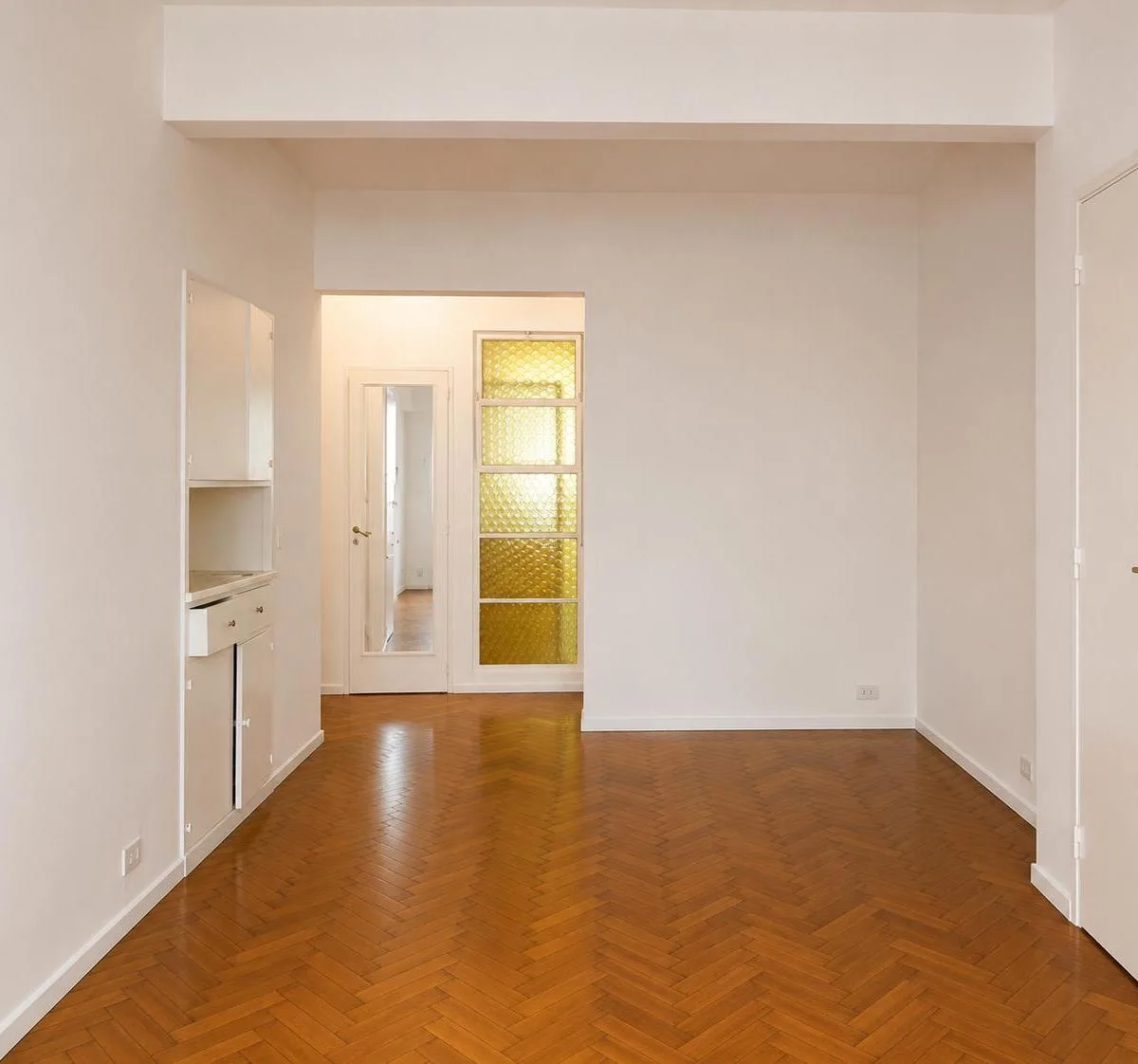Rear-facing, separate kitchen
