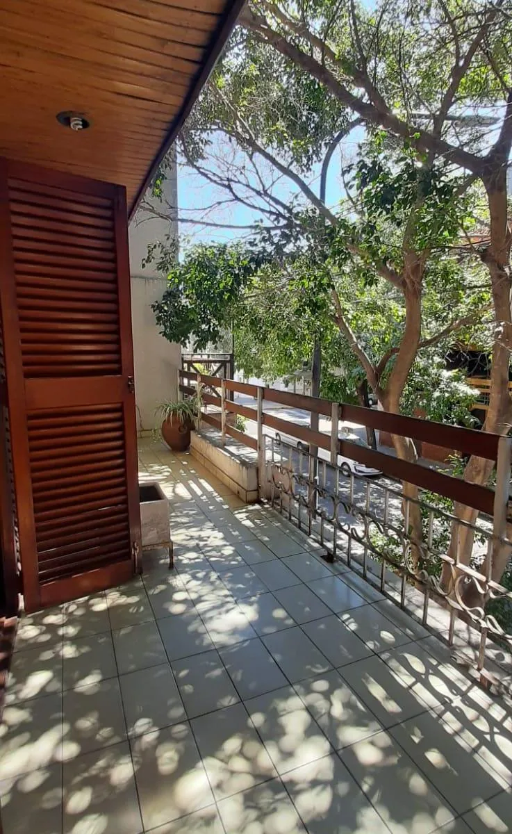 2-story house with garden