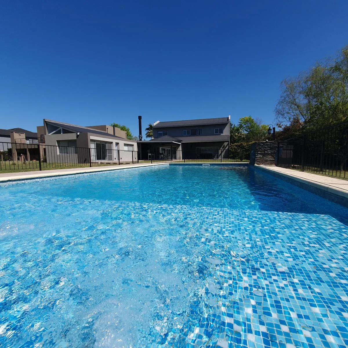 Furnished four-bedroom house in Pilar with heated pool