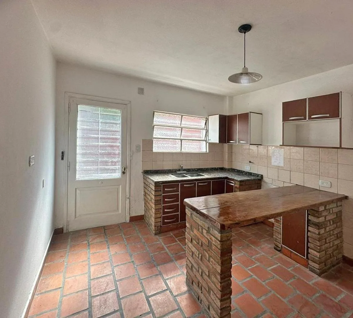 PH de dois quartos em Merlo com pátio e vaga de garagem