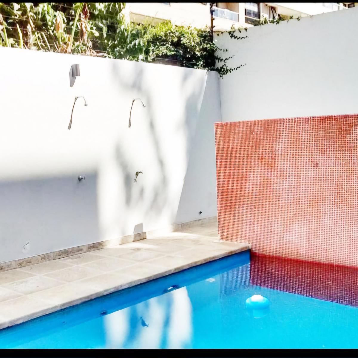 Apartamento de dois ambientes com varanda contínua em Palermo