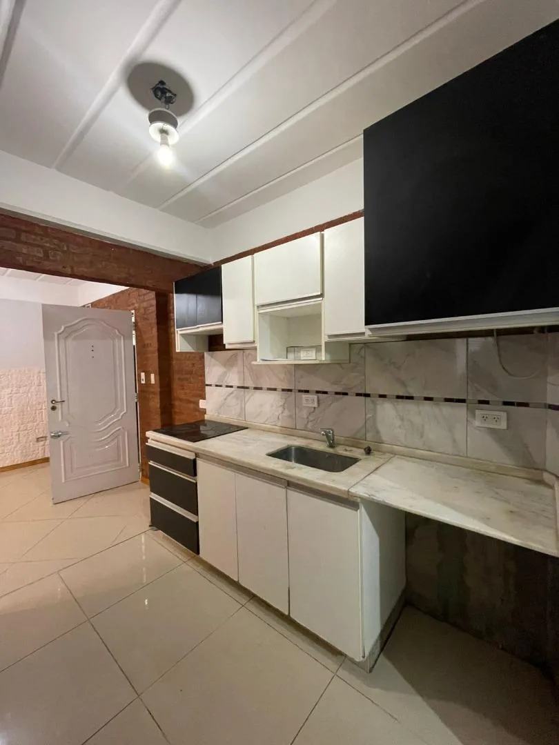 Apartamento de três ambientes com 2 dormitórios em Merlo Centro
