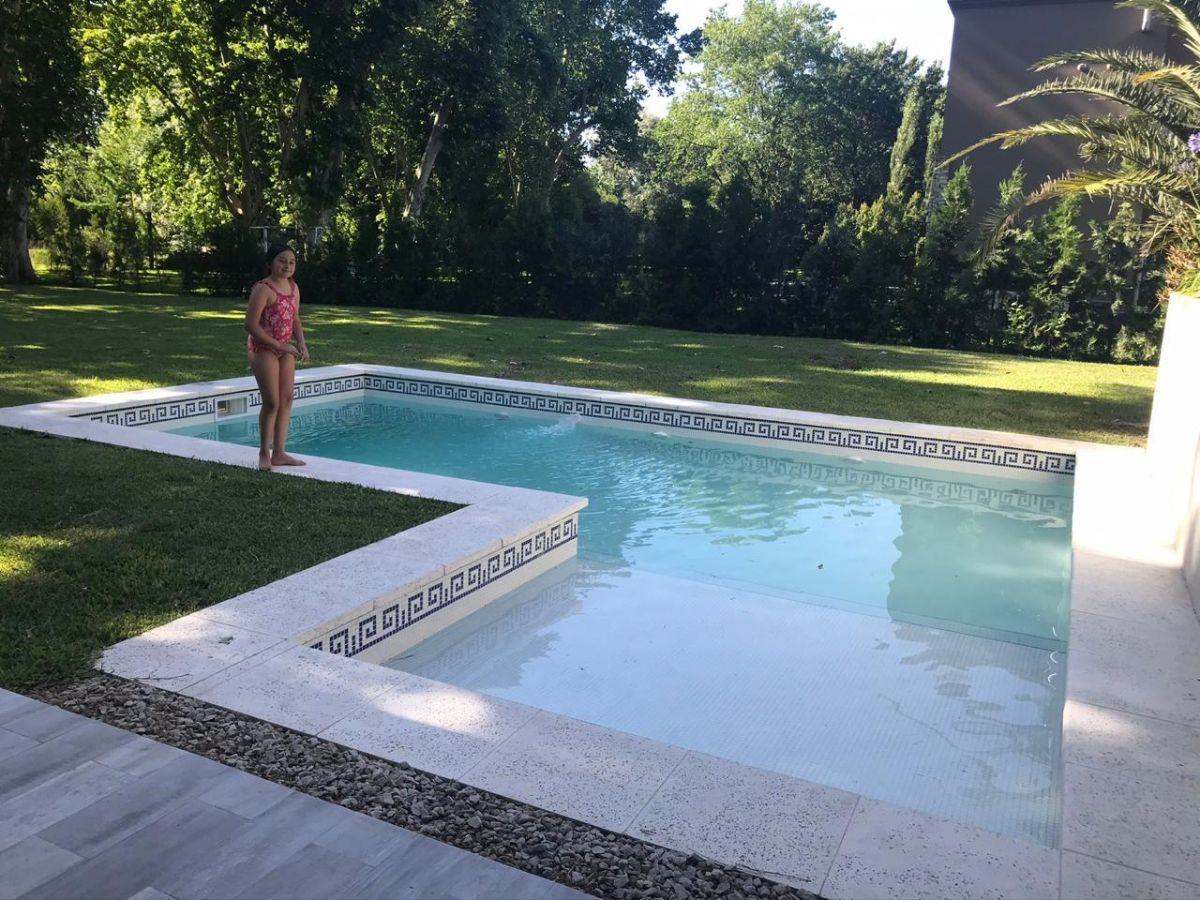 Casa térrea com 3 dormitórios em Ituzaingó, Country Los Pingüinos