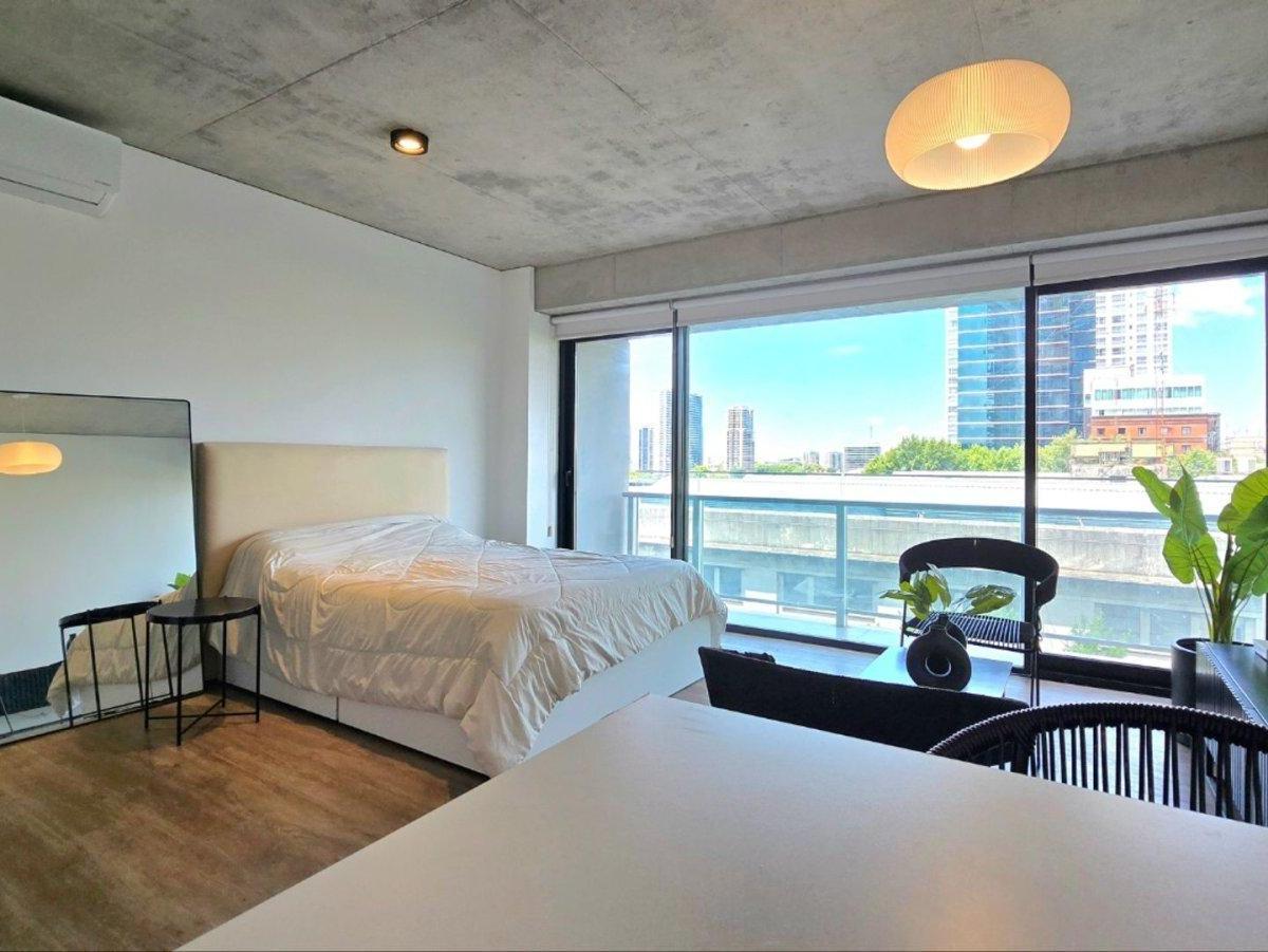Kitnet mobiliada em Puerto Madero, com varanda e ar-condicionado