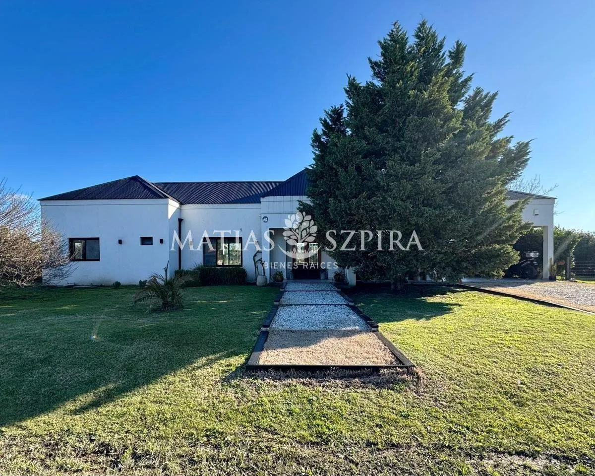 Casa de três quartos em Luján, em San Roque