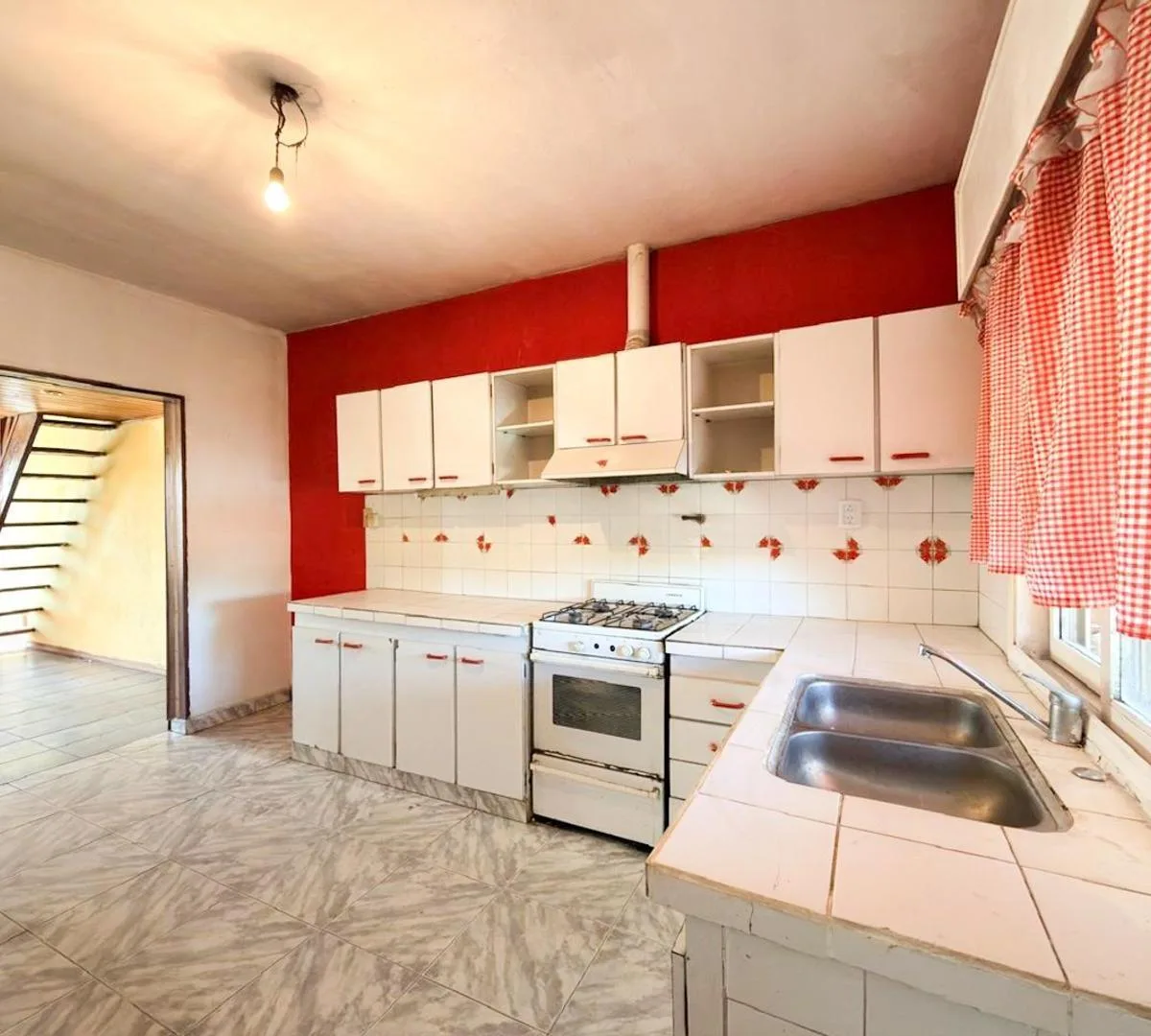 Apartamento de três ambientes com vaga de garagem em Merlo Norte