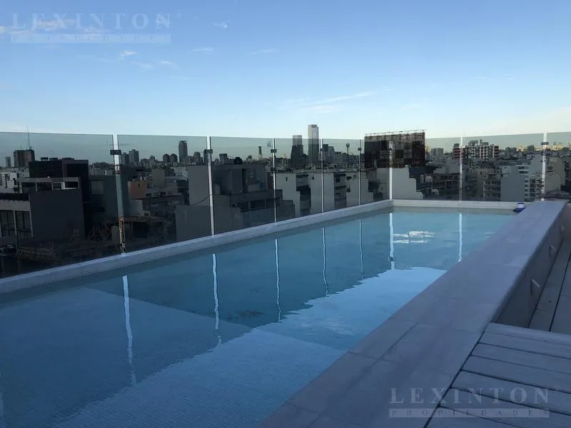 Studio mobiliado com área de churrasco e piscina em Chacarita