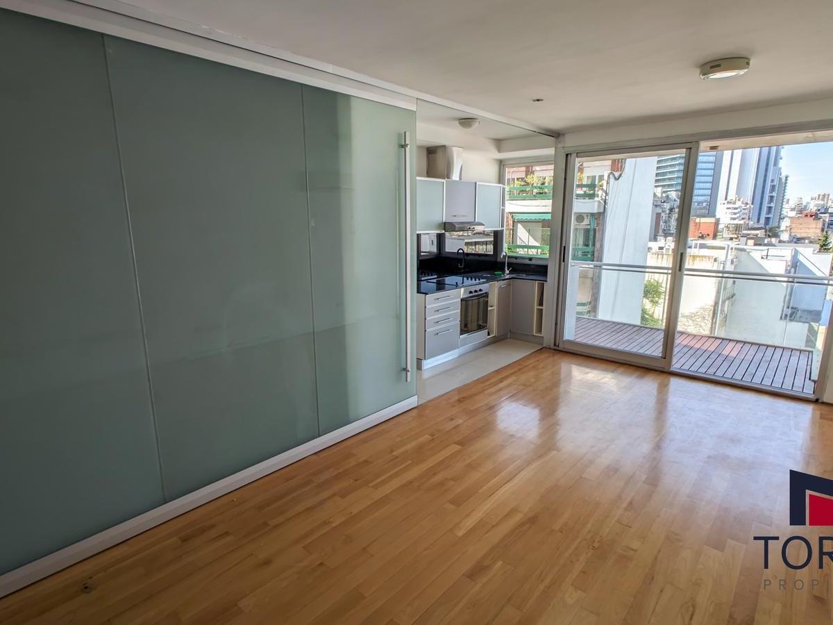 Two-room half-floor apartment with parking and terrace in Núñez
