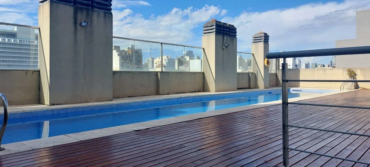 Kitnet com varanda e área de churrasco em Constitución