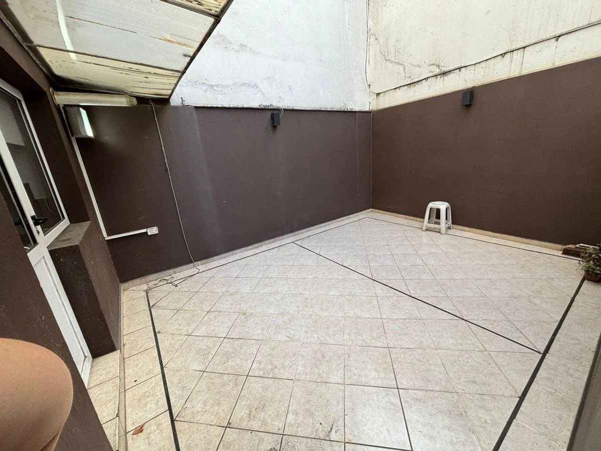 Kitnet com pátio em Caballito para alugar