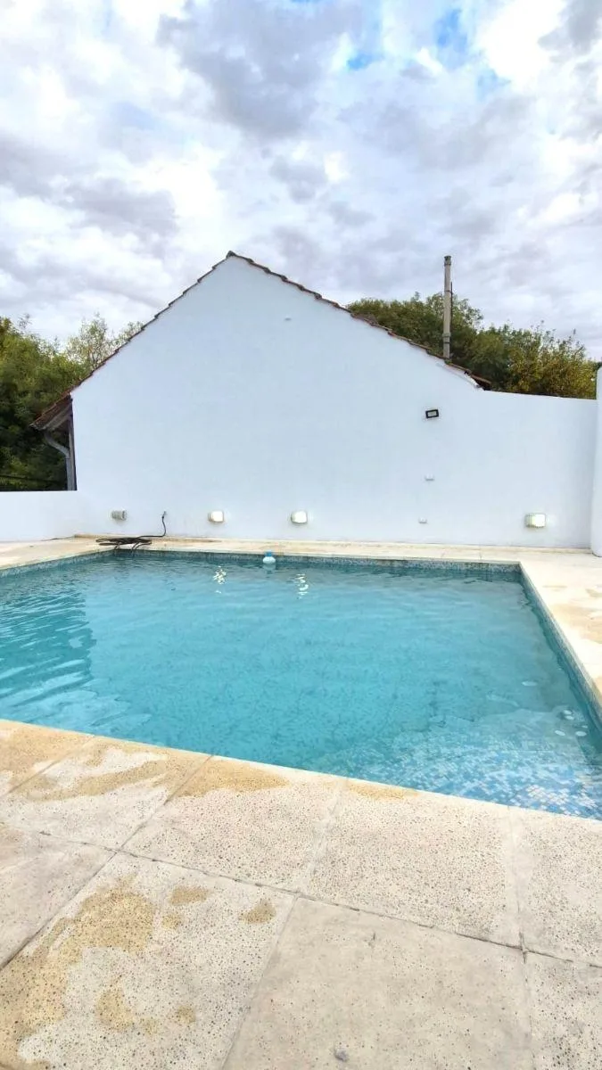 Casa de 4 dormitórios com piscina em Belgrano