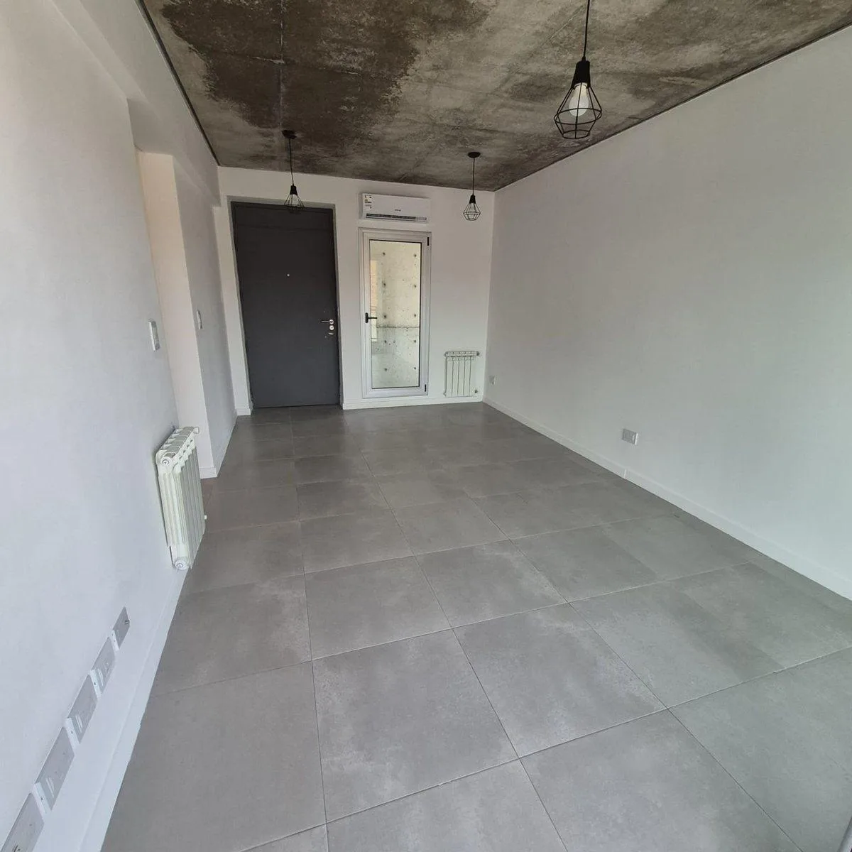 Apartamento de 3 ambientes novo em Haedo com vaga de garagem