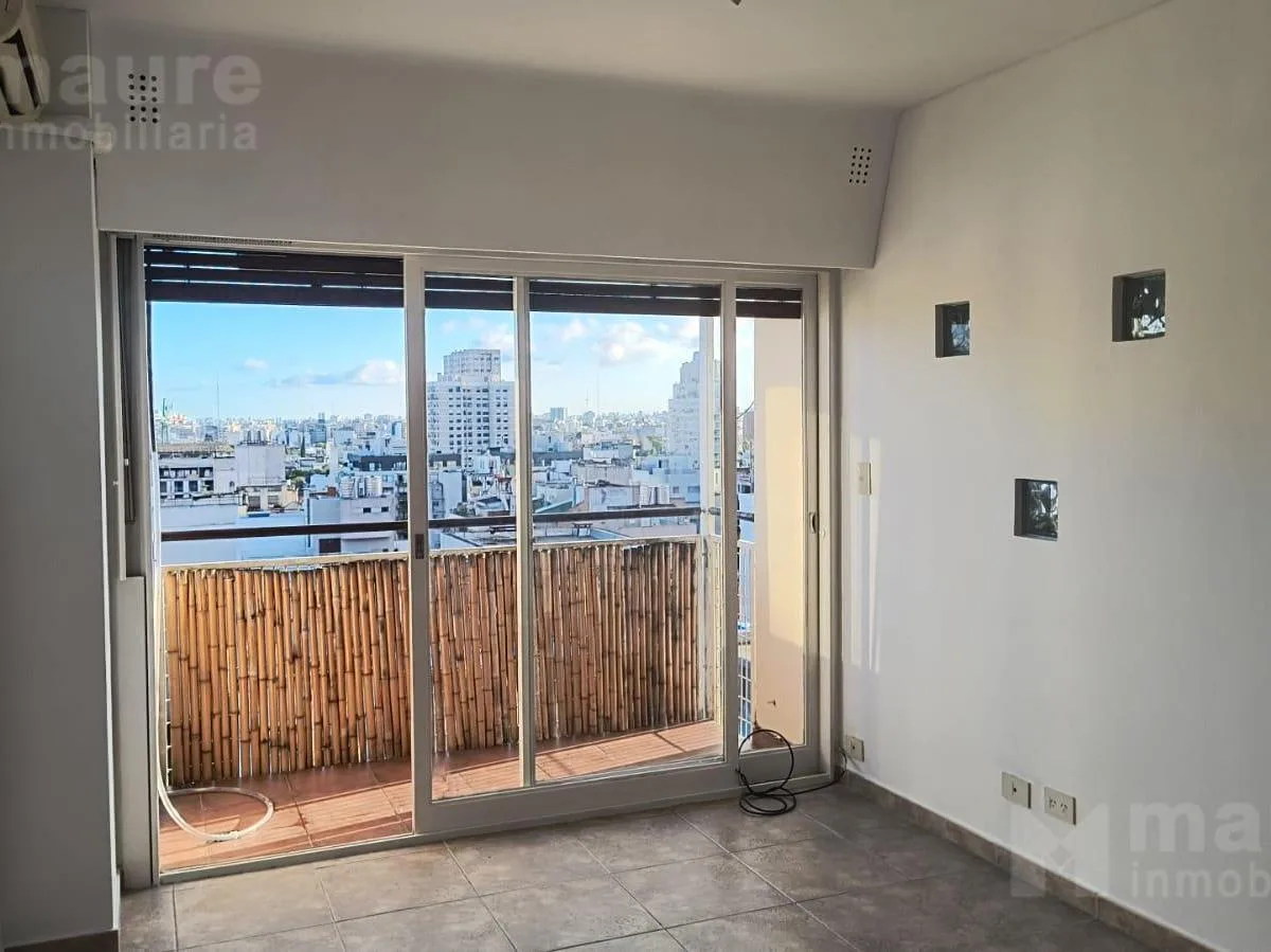 Two-room apartment on the 13th floor in Belgrano with open city views