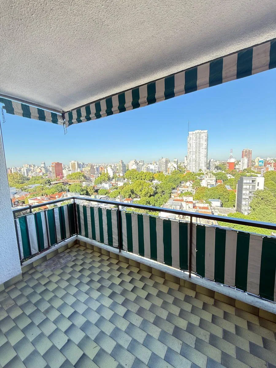 Refurbished three-room apartment with terrace balcony in Núñez