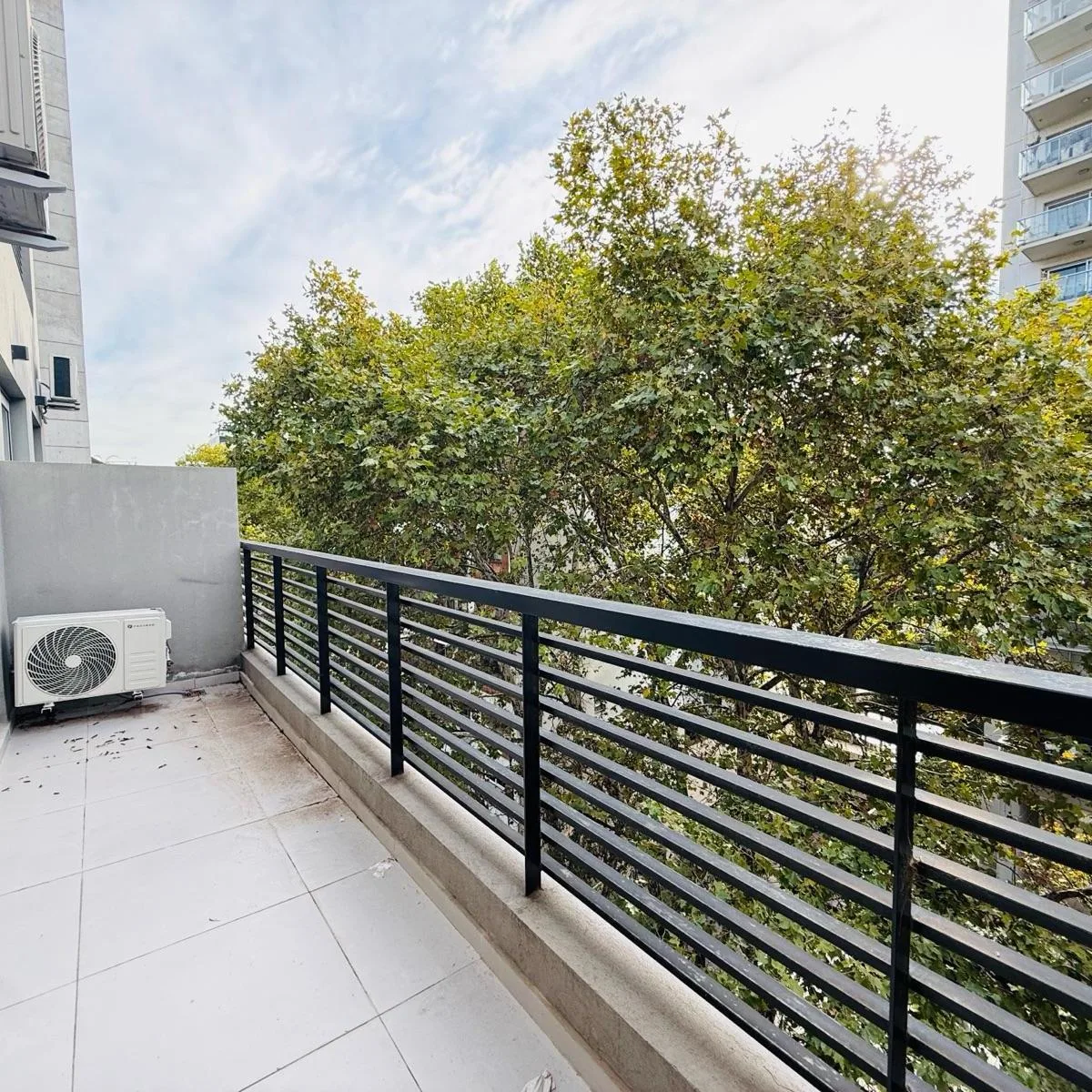 Two-room apartment in Belgrano, high floor with balcony
