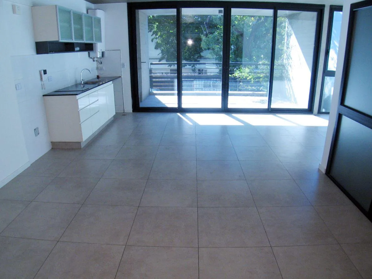 Loft com varanda tipo terraço e vaga fixa em Caballito