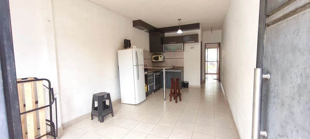 Two-room PH with parking patio and grill in Morón