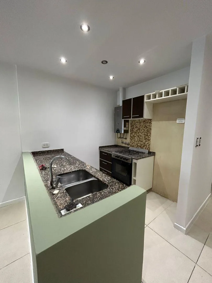 Two-room apartment with balcony and private courtyard patio in Núñez