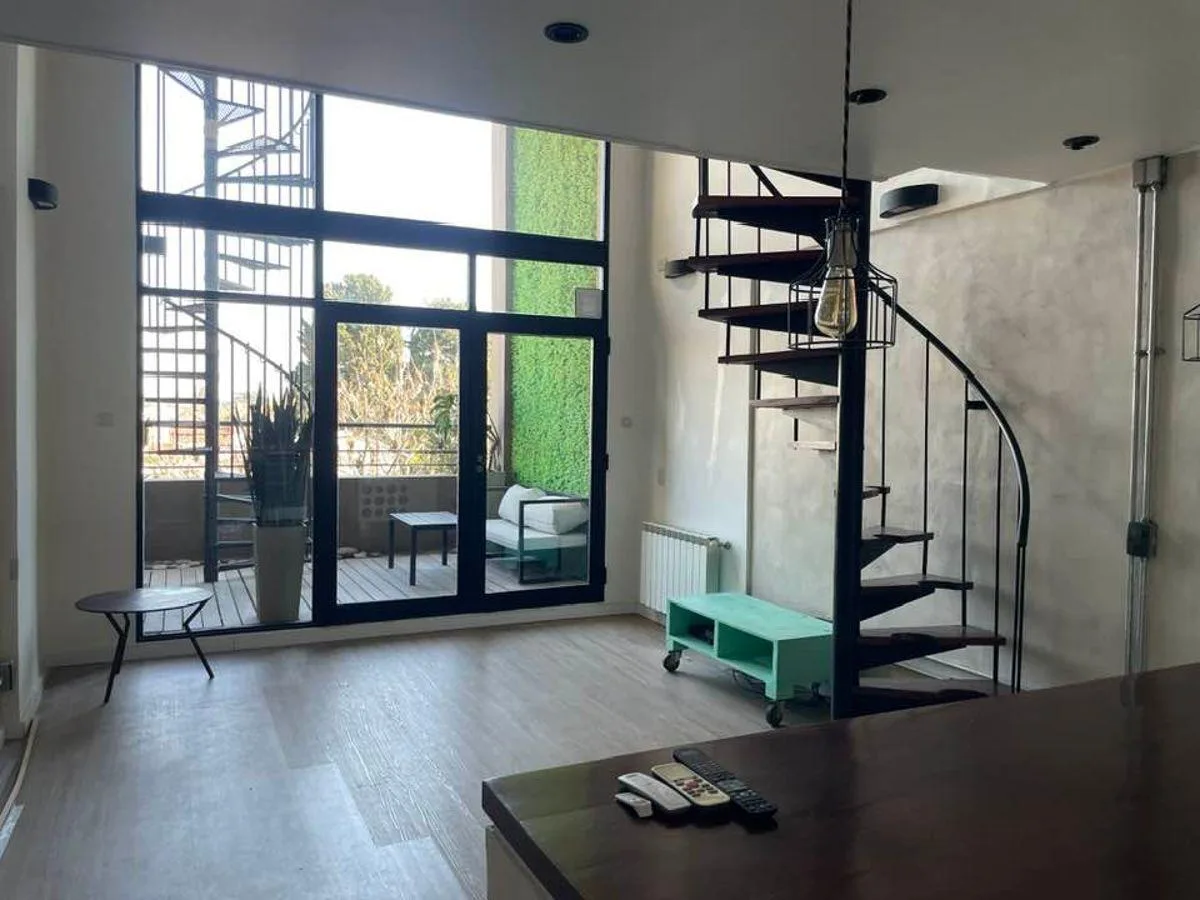 Loft with double height and 2 terraces